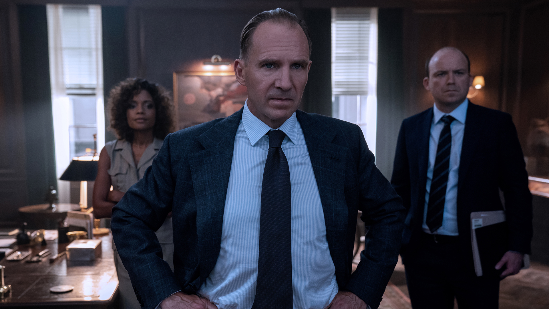 M (Ralph Fiennes), Moneypenny (Naomie Harris) and Tanner (Rory Kinnear) in 'No Time to Die.'
