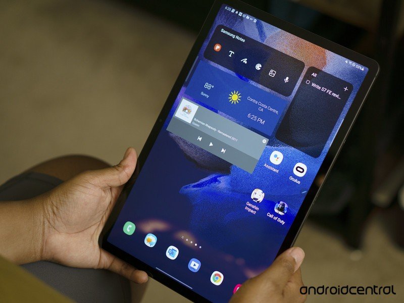 The Samsung Galaxy Tab S7 FE in portrait mode, showing Android widgets