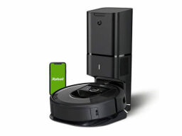 Roomba negro con estación de carga